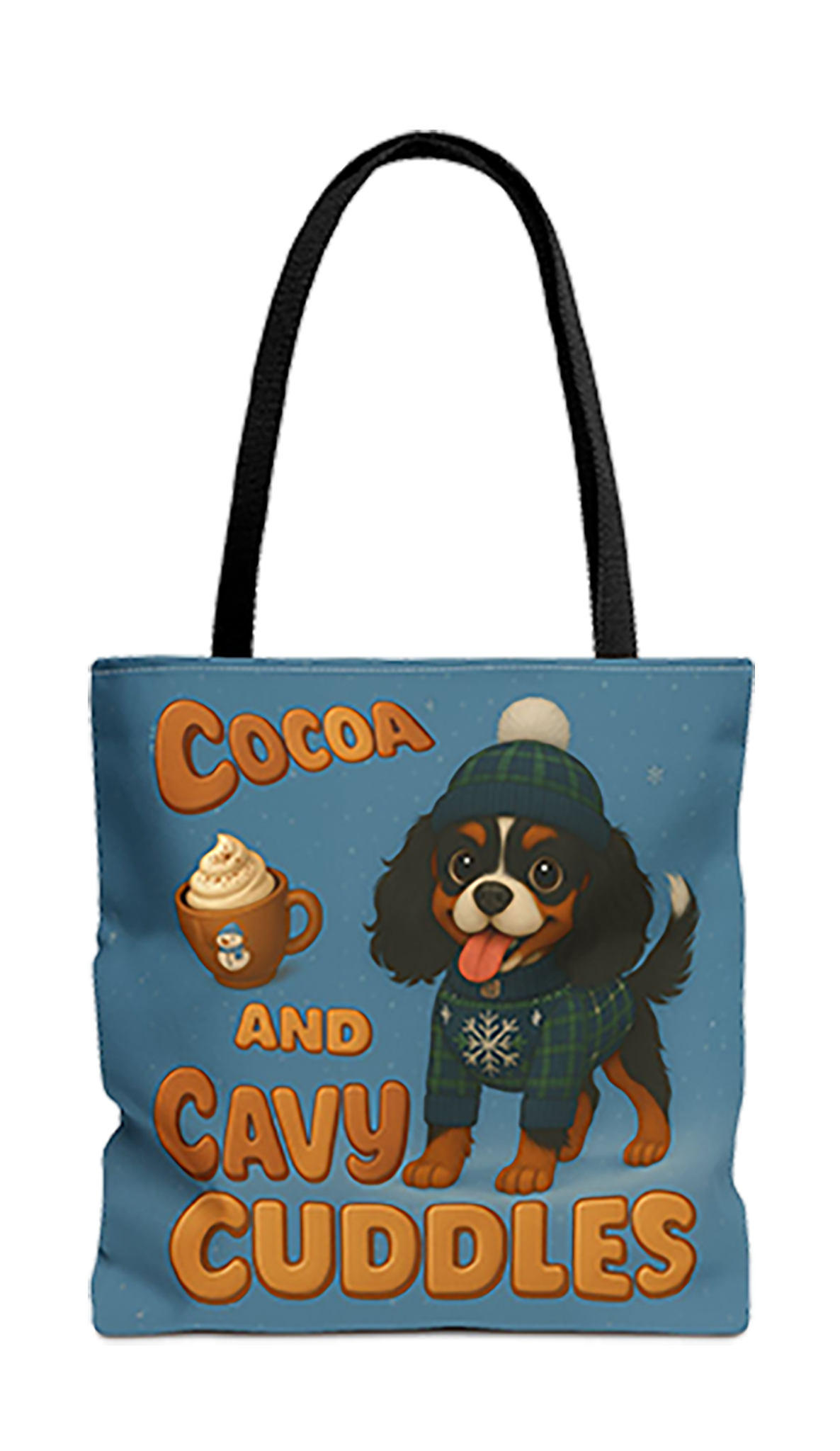 Cocoa and Cavy Cuddles tote bag with black handles, Tricolor Cavalier King Charles Spaniel puppy in a beanie and sweater with a mug of cocoa