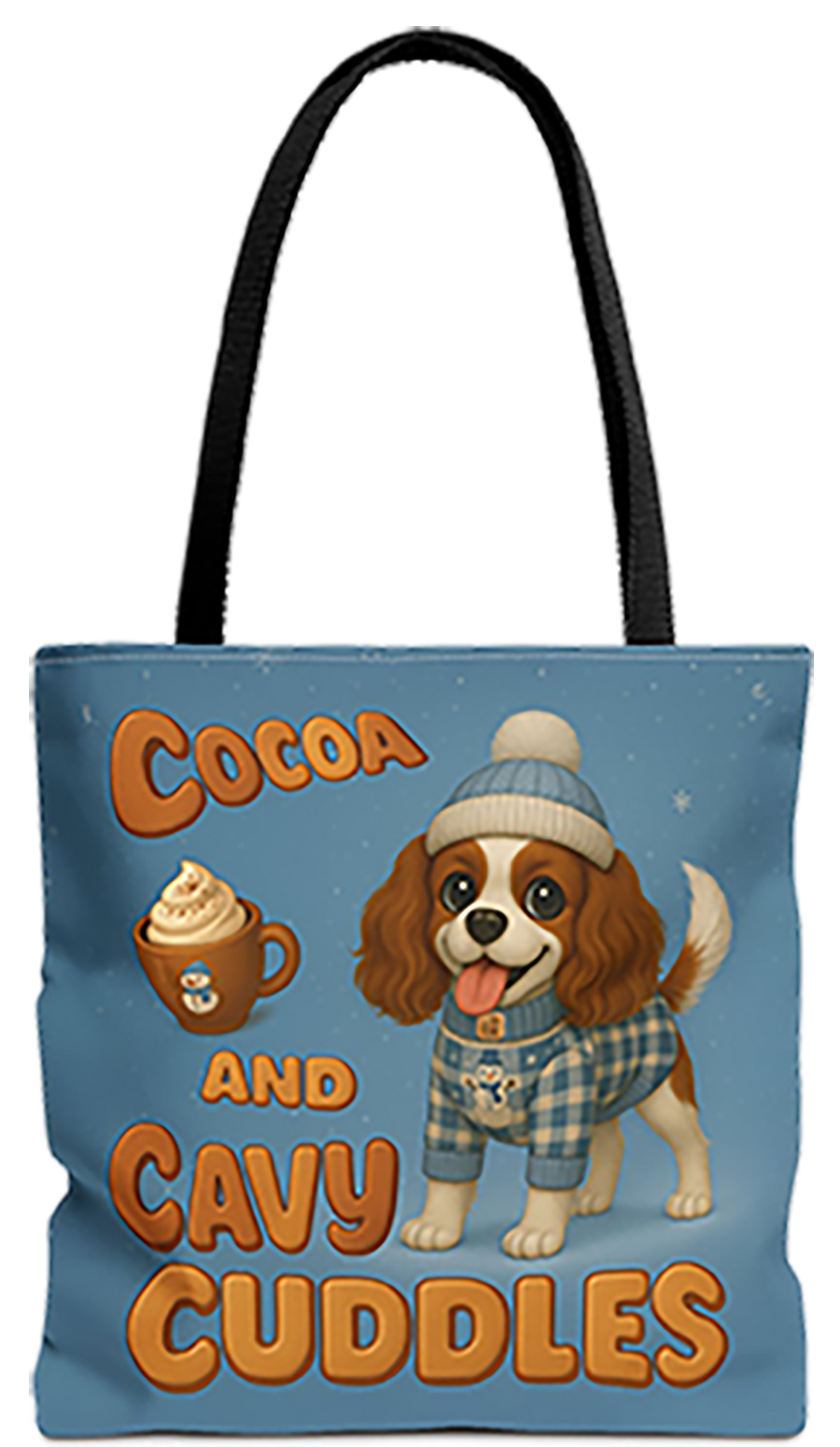 Cocoa and Cavy Cuddles tote bag with black handles, Blenheim Cavalier King Charles Spaniel puppy in a beanie and sweater with a mug of cocoa