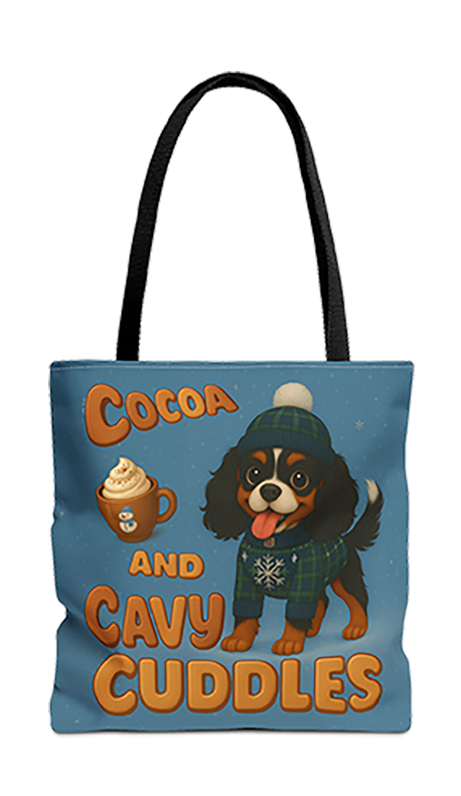 Cocoa and Cavy Cuddles tote bag with black handles, Tricolor Cavalier King Charles Spaniel puppy in a beanie and sweater with a mug of cocoa